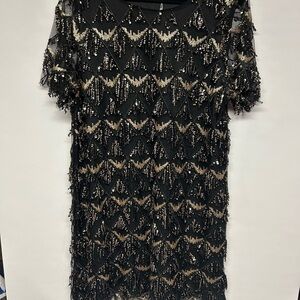 Chic Black and Gold Sequin Mini Dress